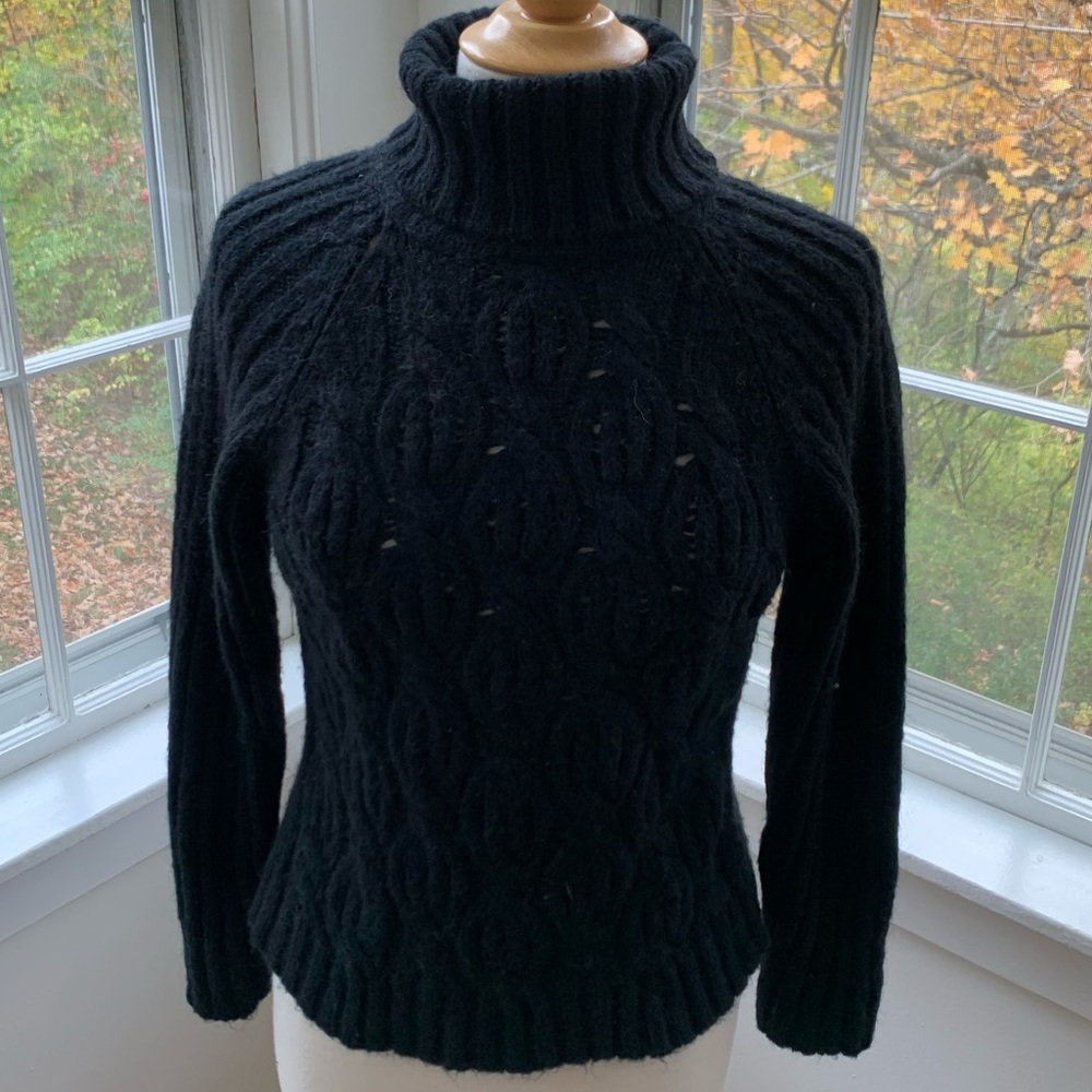 CANDA chunky black turtleneck knit patterns